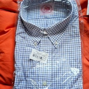 A J Press shirt,  get it now , so you look good with your suit.